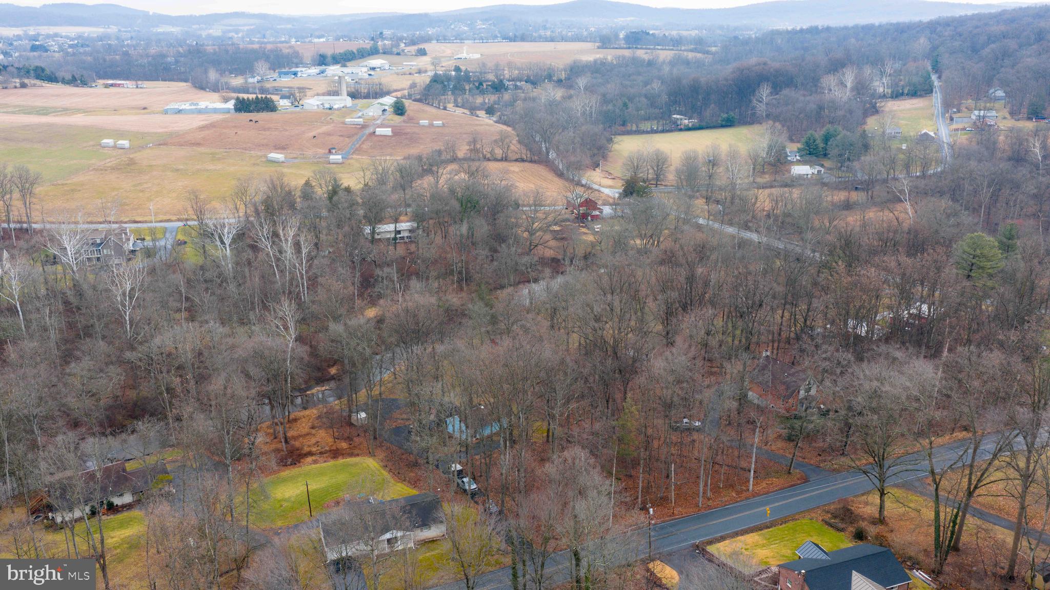 460 Greenville Road Denver, PA 17517 - Photo 48 of 50 a view of a city from a lake