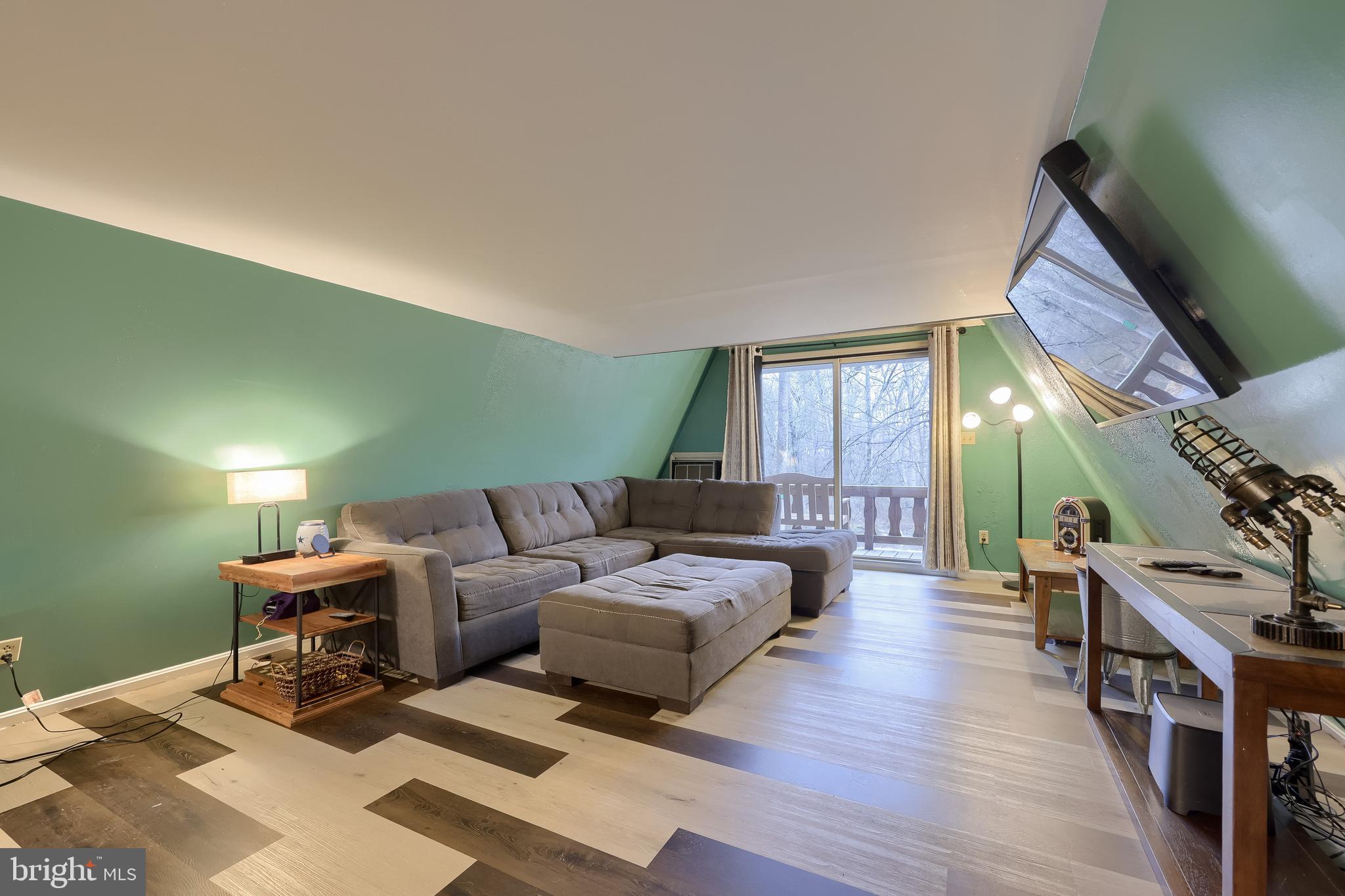 460 Greenville Road Denver, PA 17517 - Photo 10 of 50 a living room with furniture and wooden floor