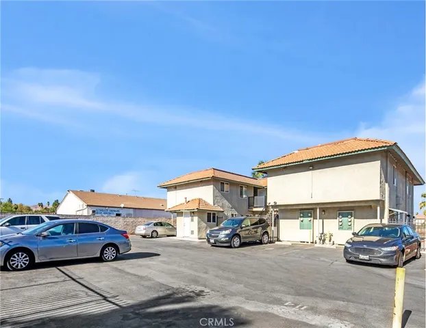 a view of parking with cars parked