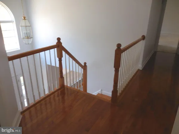 a view of staircase with rug floor