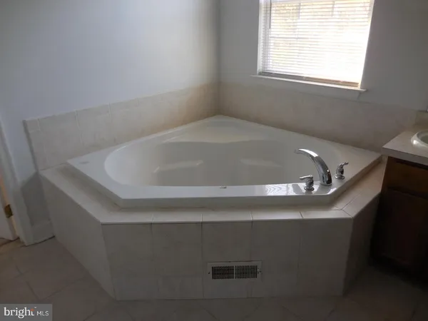 a bathroom with a tub