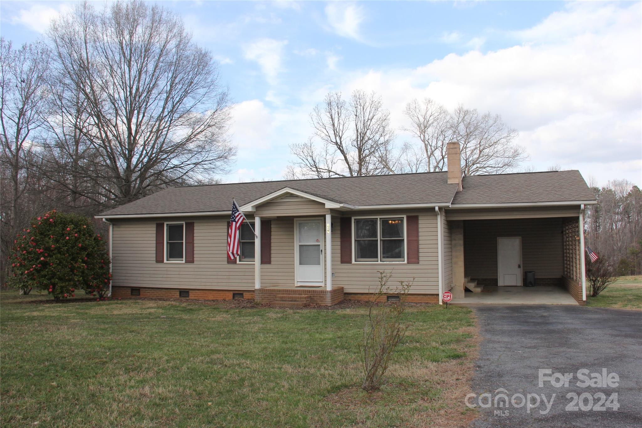 front view of a house with a yard