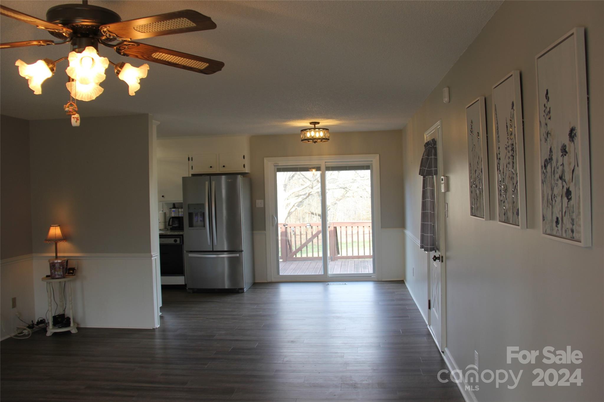 147 Sinclair Road Mooresville, NC 28115 - Photo 14 of 30 a view of empty room with wooden floor and fan