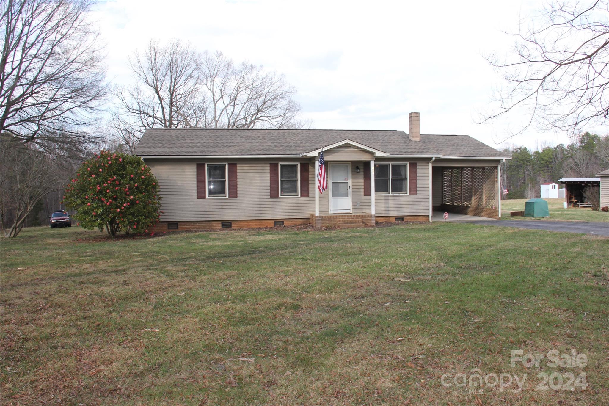 147 Sinclair Road Mooresville, NC 28115 - Photo 2 of 30 a front view of house with yard and green space