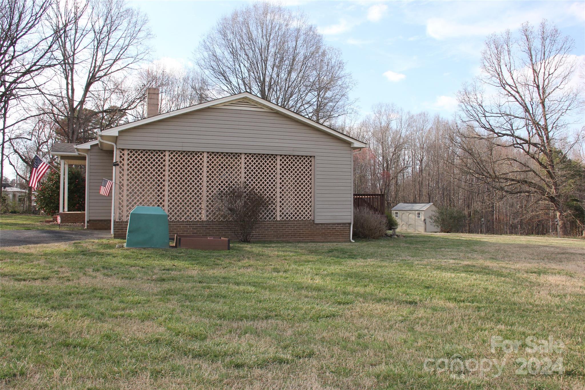 147 Sinclair Road Mooresville, NC 28115 - Photo 29 of 30 a view of a house with a yard