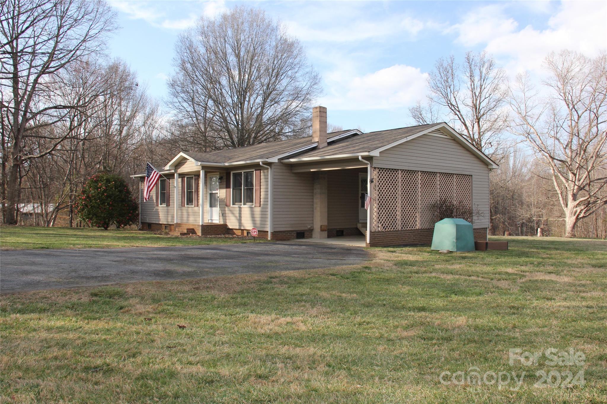 147 Sinclair Road Mooresville, NC 28115 - Photo 4 of 30 a view of a house with a yard