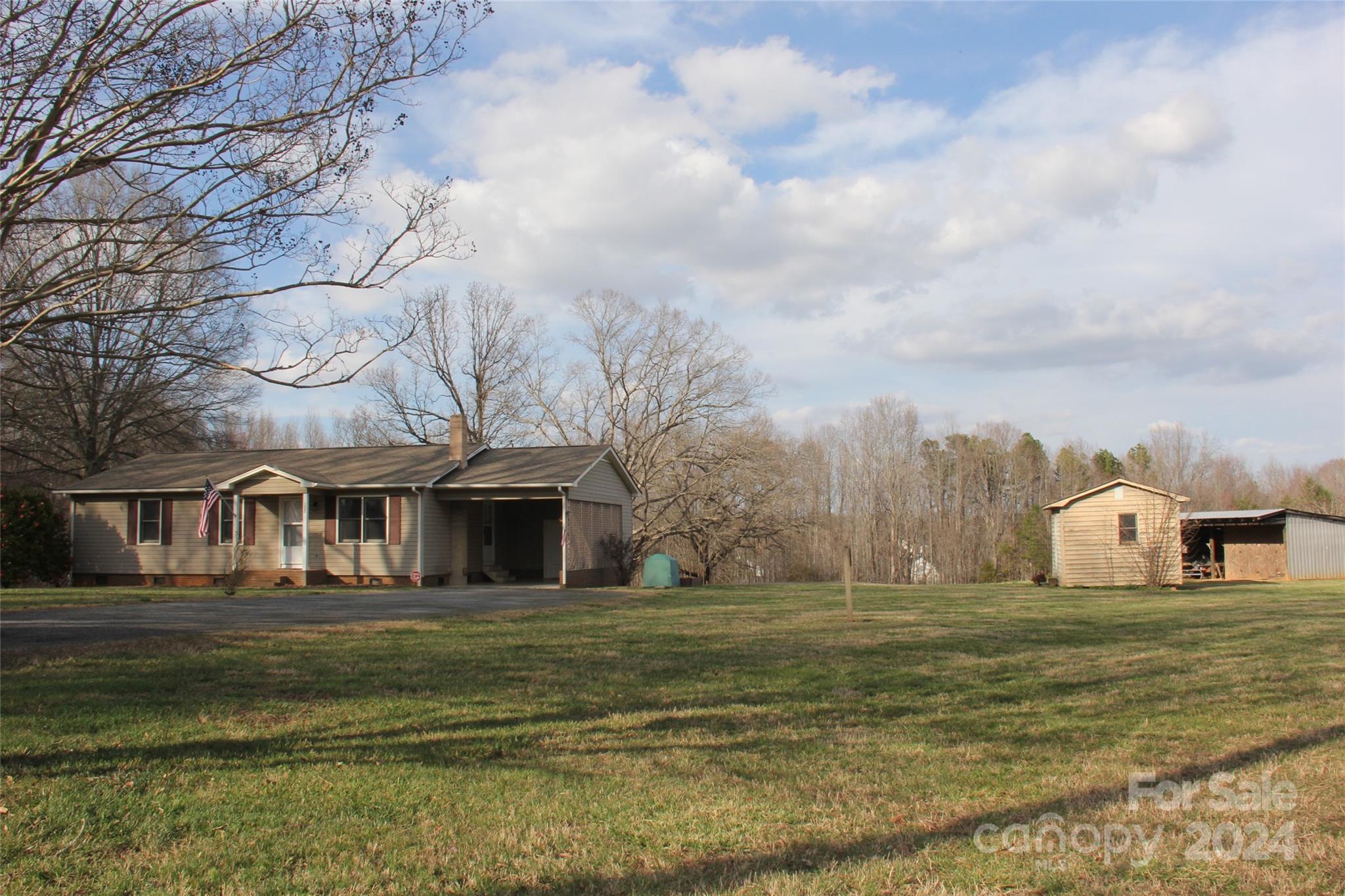 147 Sinclair Road Mooresville, NC 28115 - Photo 6 of 30 a front view of residential houses with outdoor space