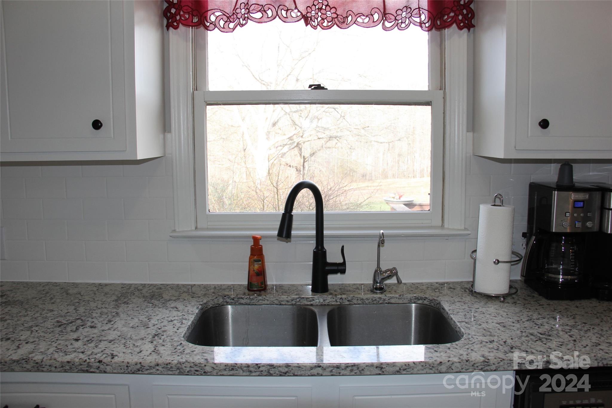 147 Sinclair Road Mooresville, NC 28115 - Photo 9 of 30 a close view of sink and tap