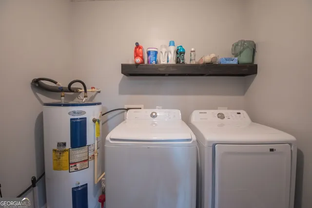a view of a garage with rack and bicycle