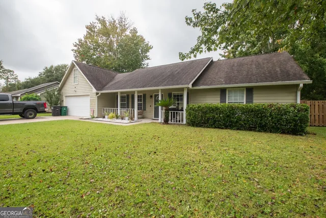 a house with trees in the background