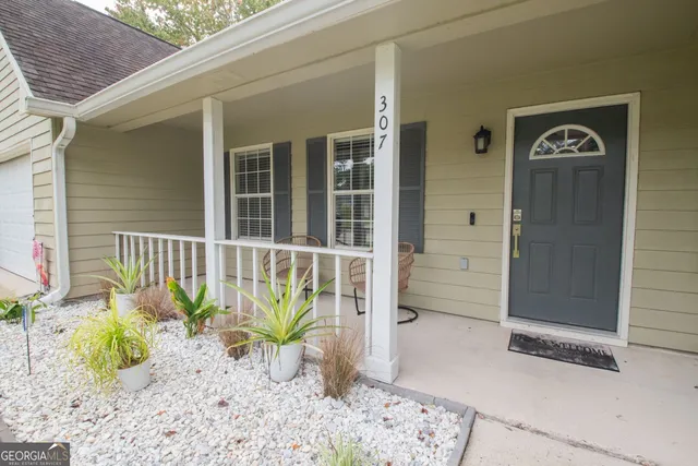 a view of a entryway door front of house