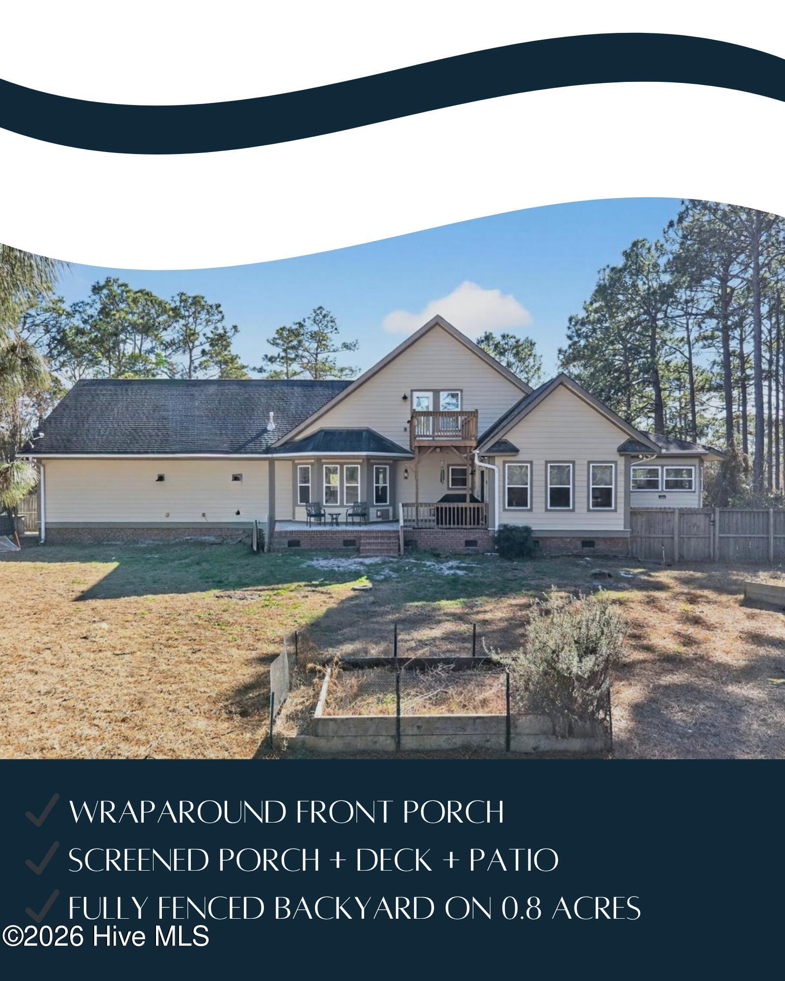 18 Brierwood Road Southwest Shallotte, NC 28470 - Photo 6 of 70 Expansive back yard and full view of this well-maintained Shallotte home offering privacy and space just minutes from the coast.