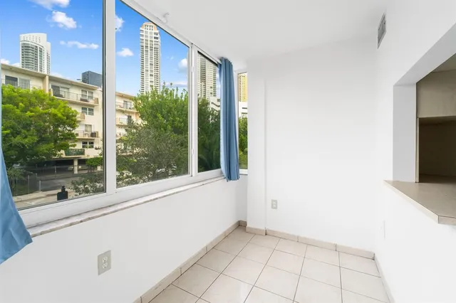 a view of a house with a large window