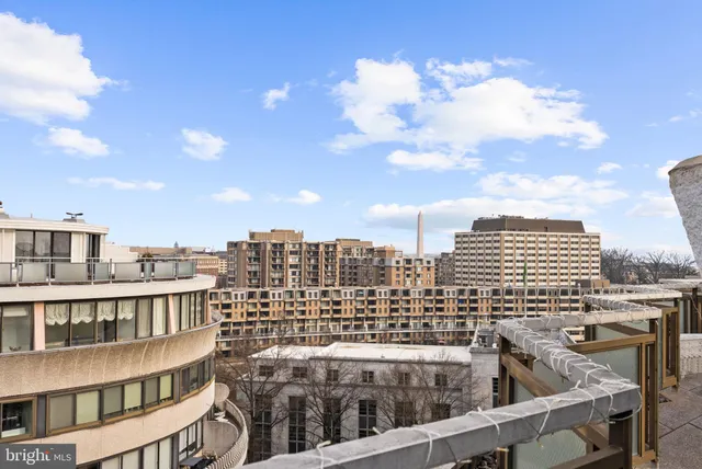 a view of a city with tall buildings