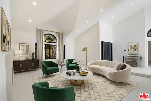 a living room with furniture and a couch