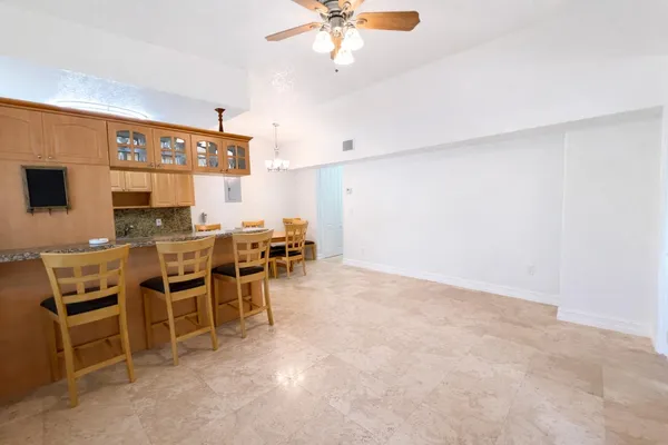 a view of a dining room with furniture