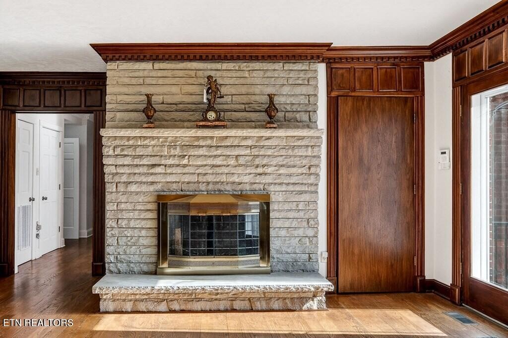 6211 Rocky Point Road Cookeville, TN 38506 - Photo 26 of 59 a view of fireplace and wooden floor
