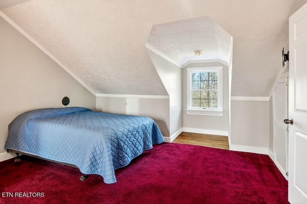 6211 Rocky Point Road Cookeville, TN 38506 - Photo 50 of 59 a bedroom with a bed and a window