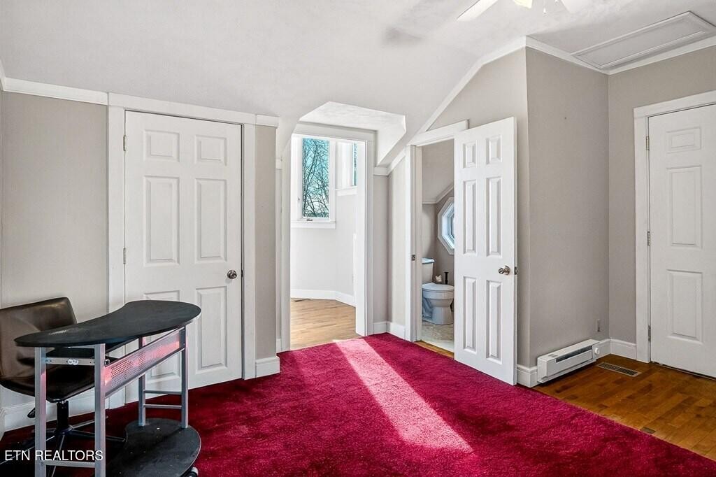 6211 Rocky Point Road Cookeville, TN 38506 - Photo 51 of 59 a bedroom with a bed and a window