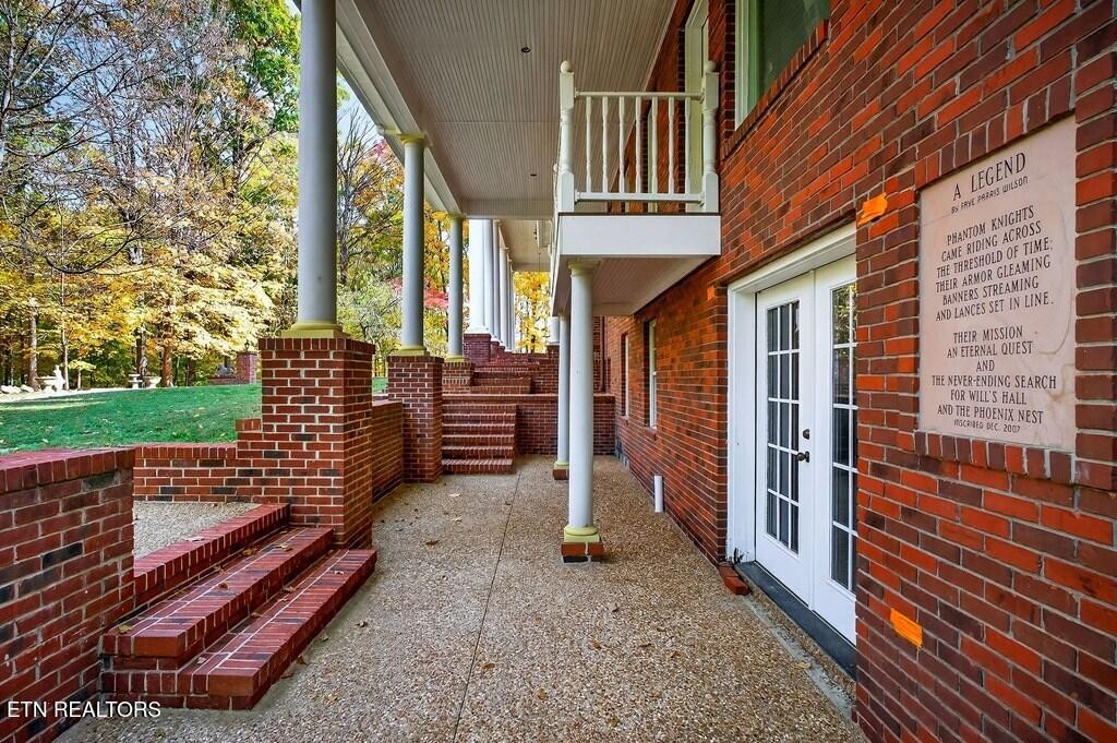 6211 Rocky Point Road Cookeville, TN 38506 - Photo 7 of 59 a view of front door of house with stairs