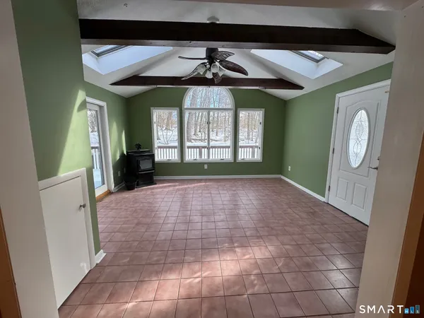 a view of entryway with a front door