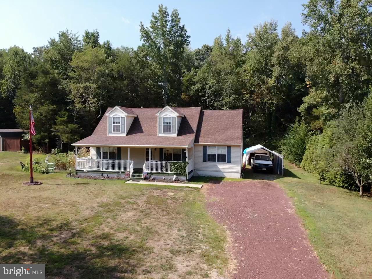 53 Maple Road Elmer, NJ 08318 - Photo 25 of 30 a house view with a sitting space and garden