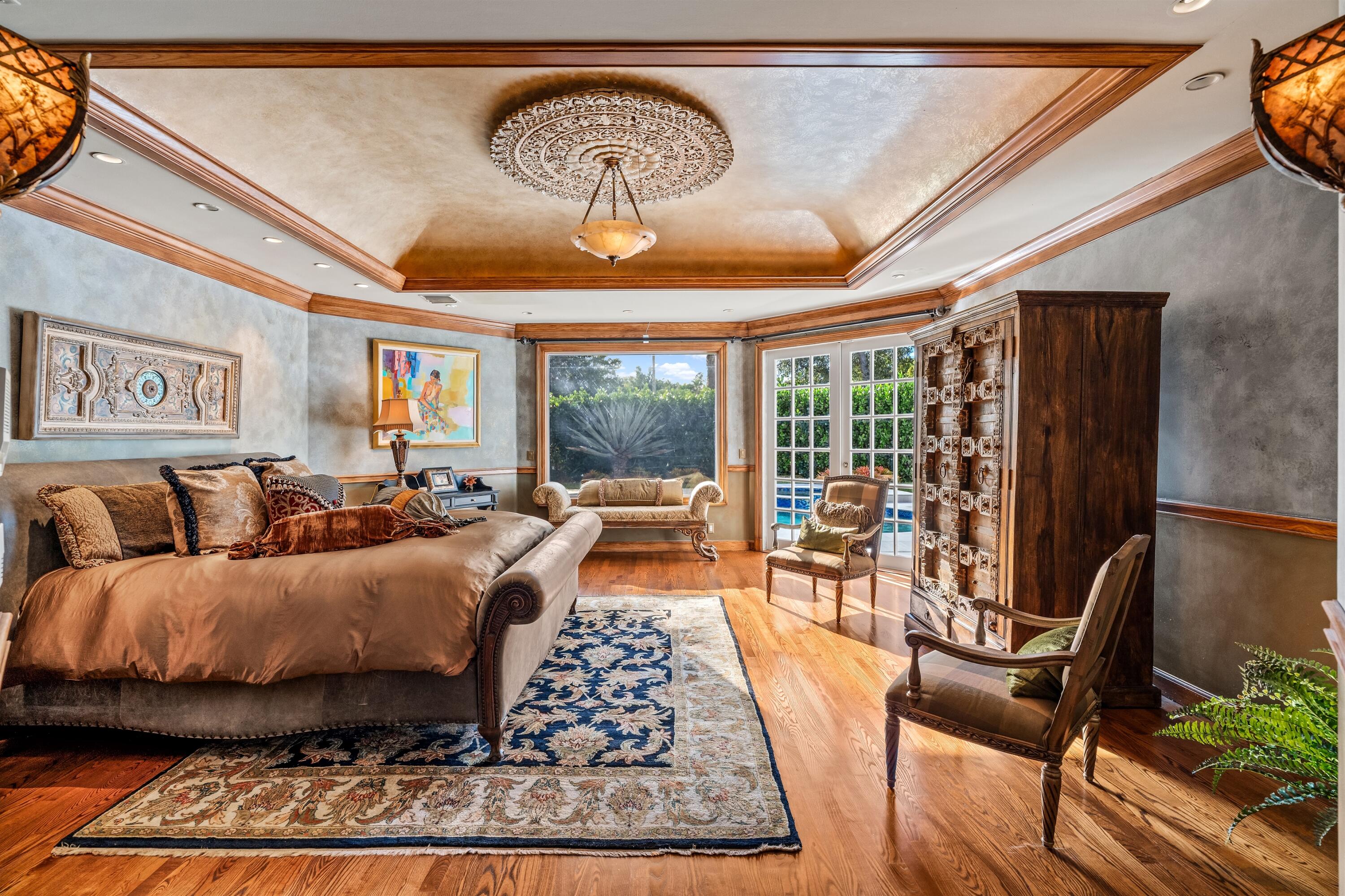 4475 Northwest 24th Terrace Boca Raton, FL 33431 - Photo 12 of 17 a living room with furniture and a large window