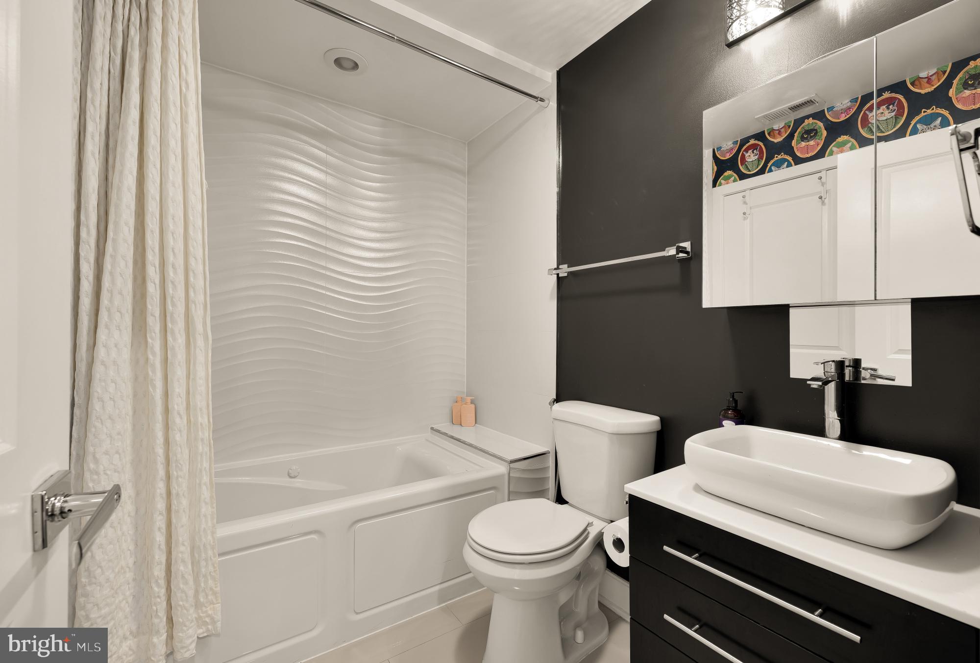 3602 16th Street Northwest, Unit 4 Washington, DC 20010 - Photo 19 of 50 Hall bathroom with bedroom access as well