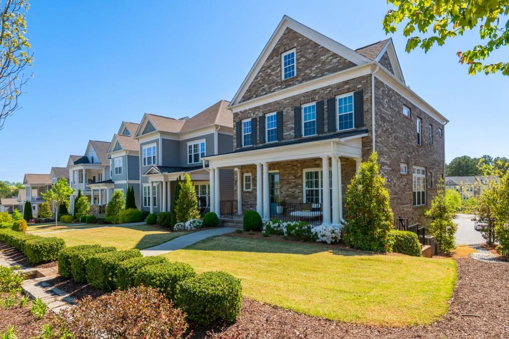 595 Hanlon Way Alpharetta, GA 30009 - Photo 2 of 33 a view of a building with a garden