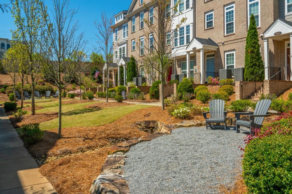595 Hanlon Way Alpharetta, GA 30009 - Photo 28 of 33 a row of benches sitting in front of a building