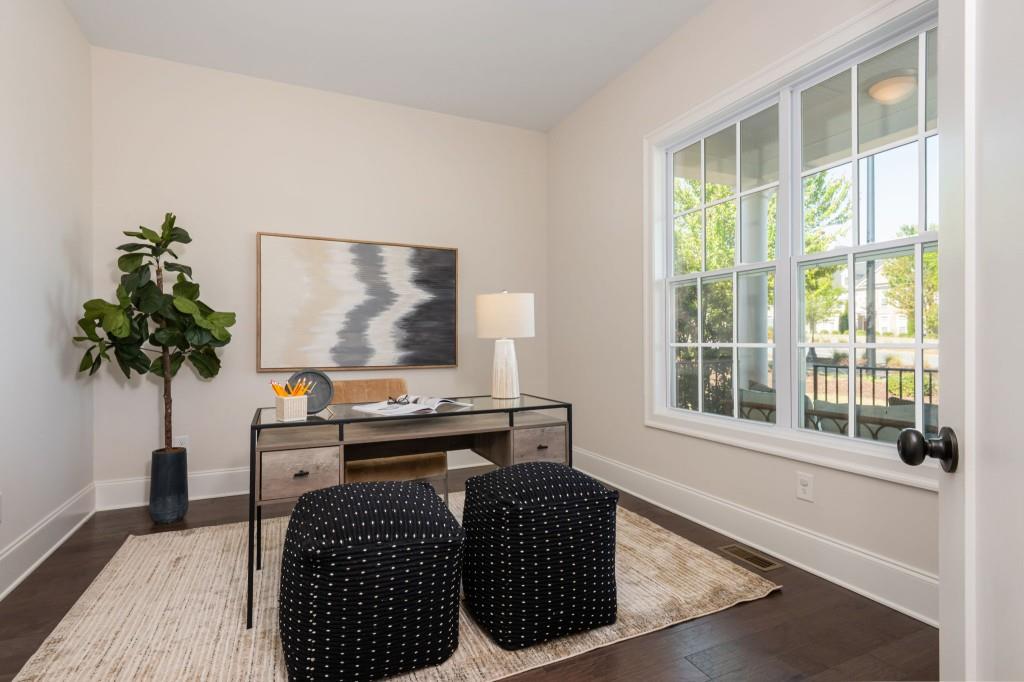 595 Hanlon Way Alpharetta, GA 30009 - Photo 5 of 33 a living room with furniture a window and a potted plant