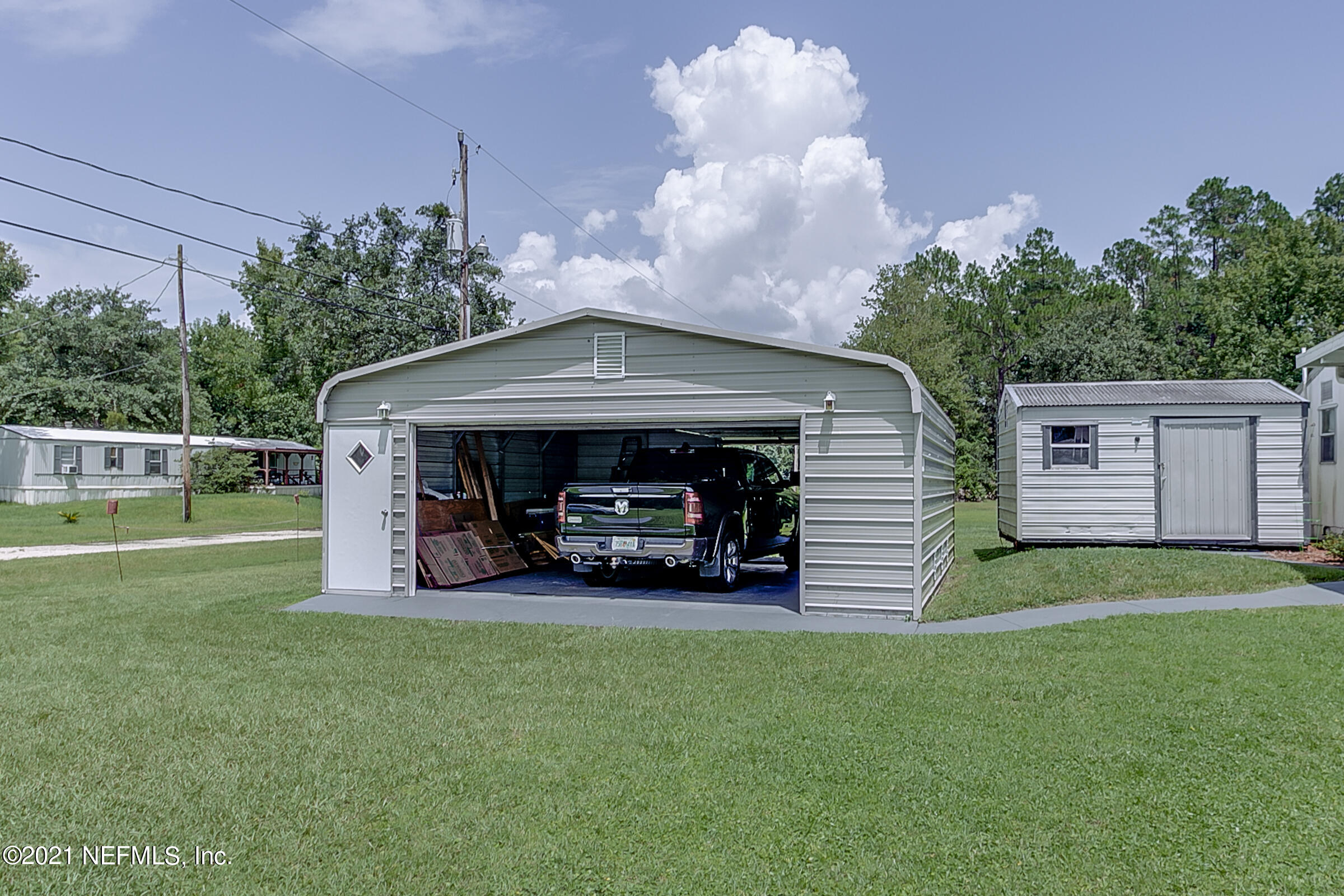 102 Cove Road Satsuma, FL 32189 - Photo 33 of 34 32-Drive-Thru-Garage-1