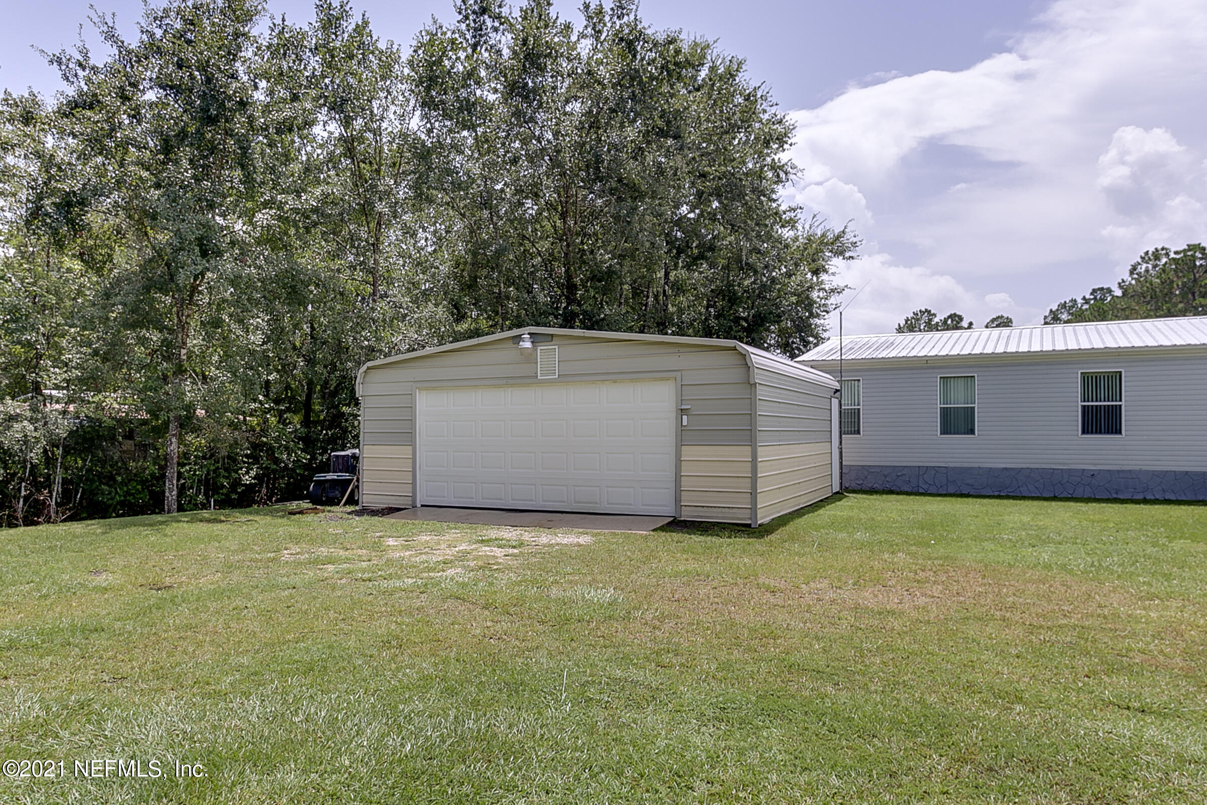 102 Cove Road Satsuma, FL 32189 - Photo 34 of 34 33-Drive-Thru-Garage-2