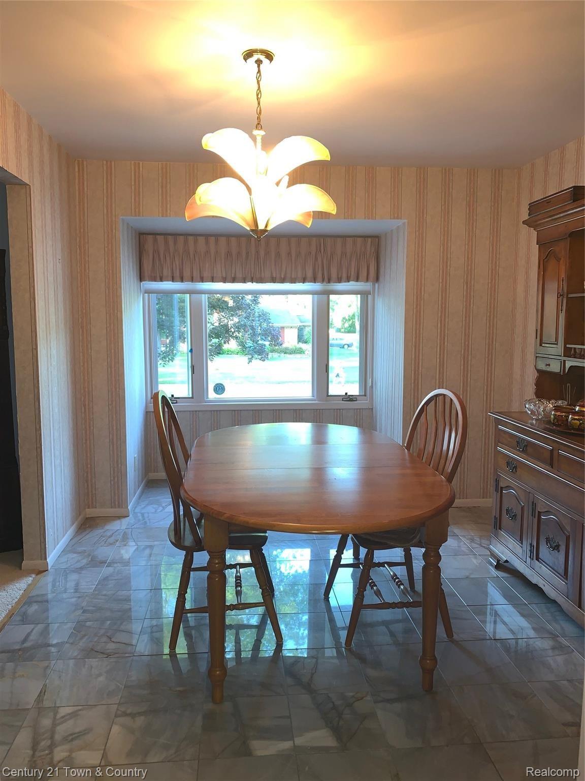 6352 Kings Pointe Road Grand Blanc, MI 48439 - Photo 12 of 21 Formal dining w/ marble floors