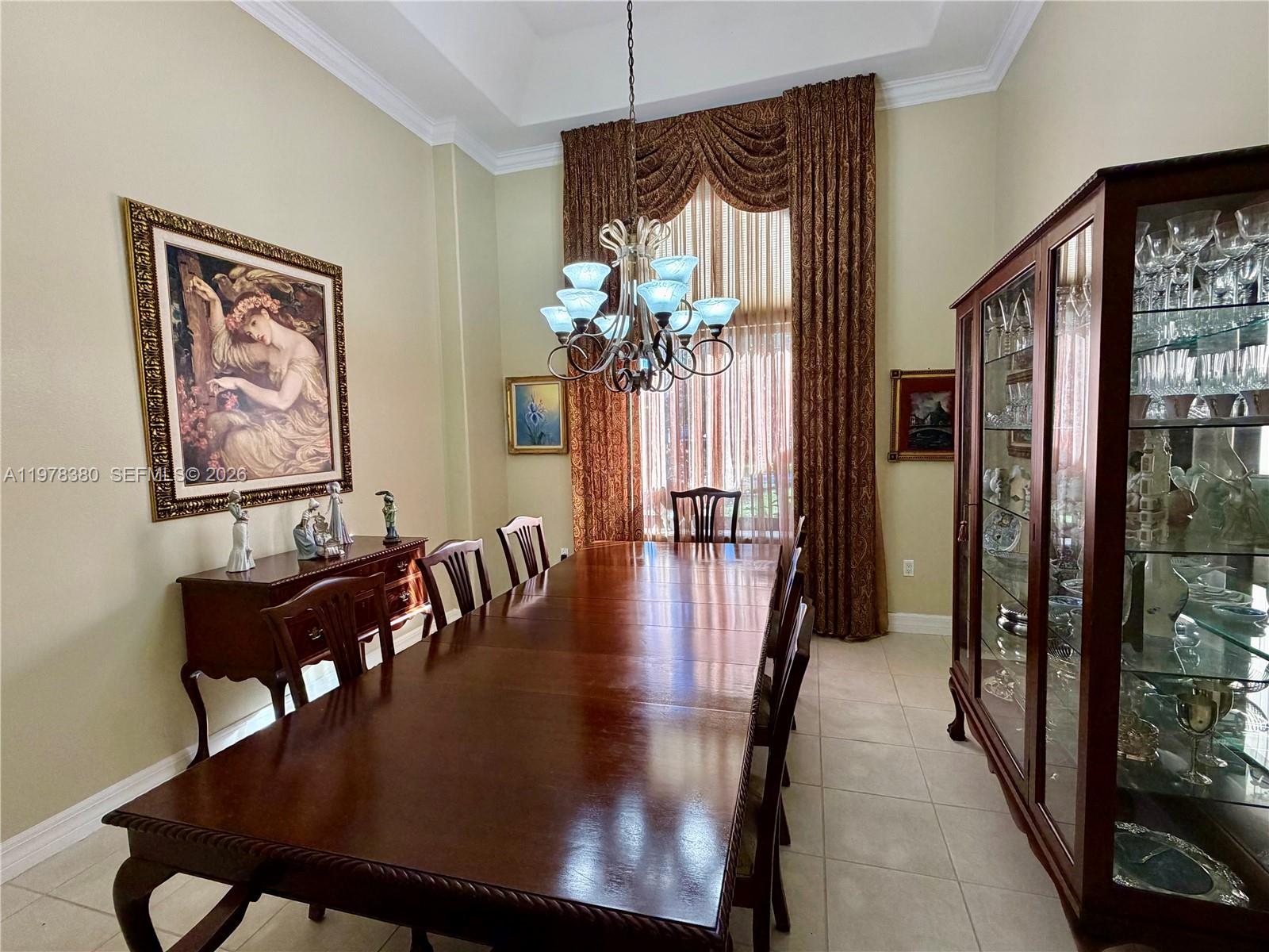 12391 Southwest 75th Street Miami, FL 33183 - Photo 19 of 89 a view of a dining room with furniture window and wooden floor