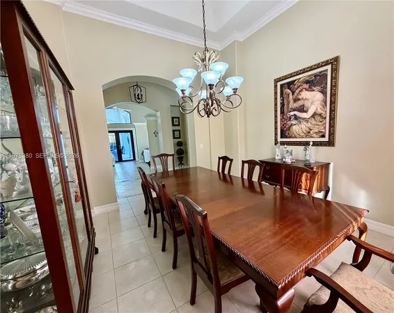 a kitchen with stainless steel appliances granite countertop wooden cabinets a stove and a microwave