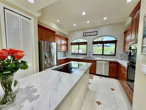 a bathroom with a double vanity sink mirror and