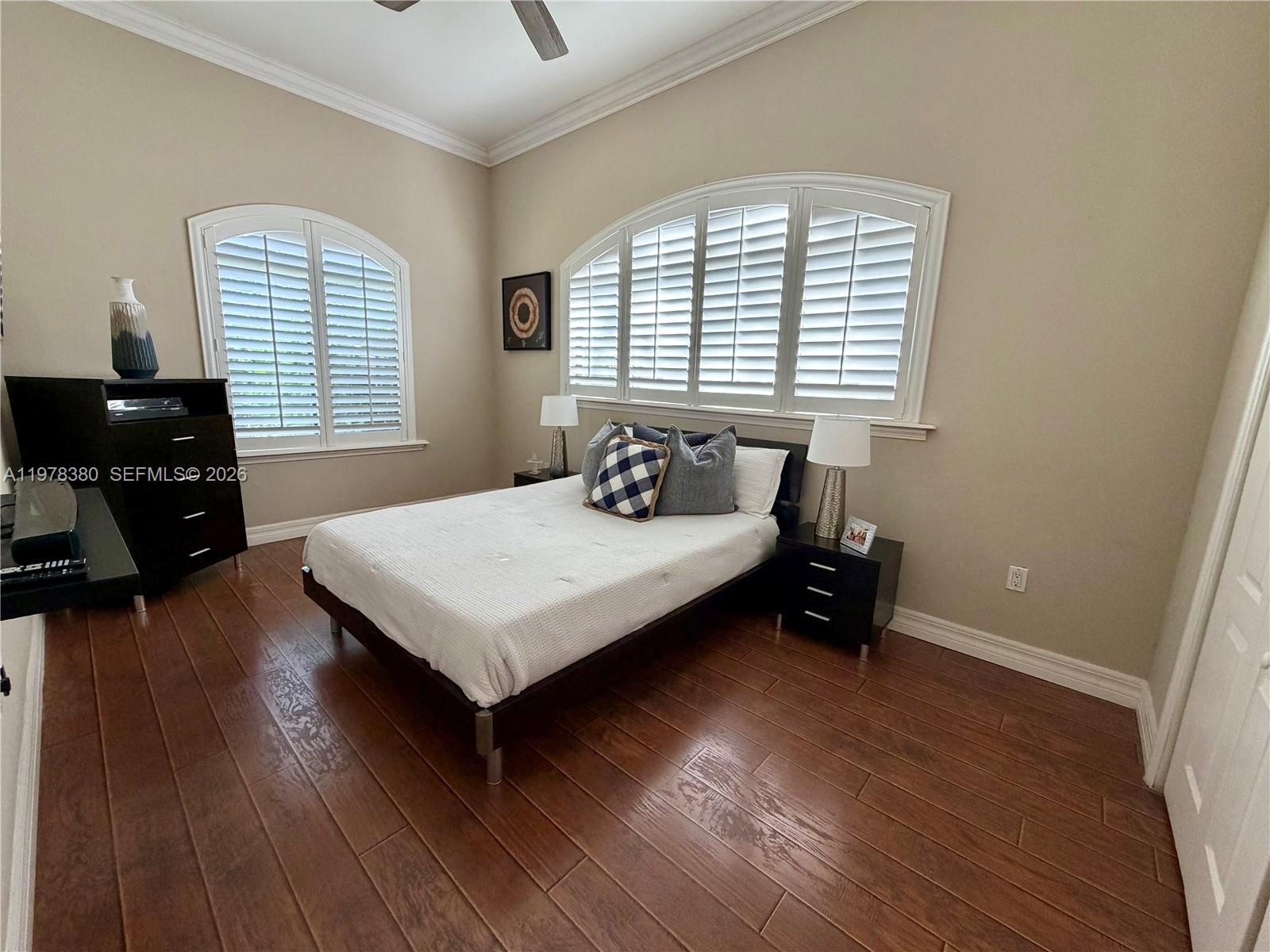 12391 Southwest 75th Street Miami, FL 33183 - Photo 56 of 89 a bedroom with a bed and a window