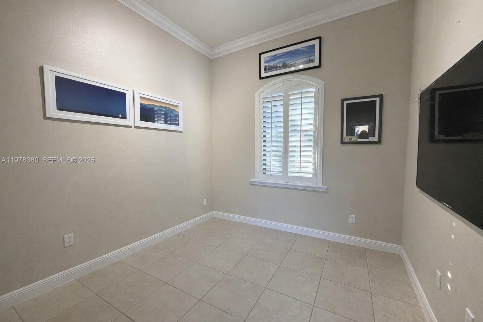 12391 Southwest 75th Street Miami, FL 33183 - Photo 70 of 89 a view of an empty room with a window
