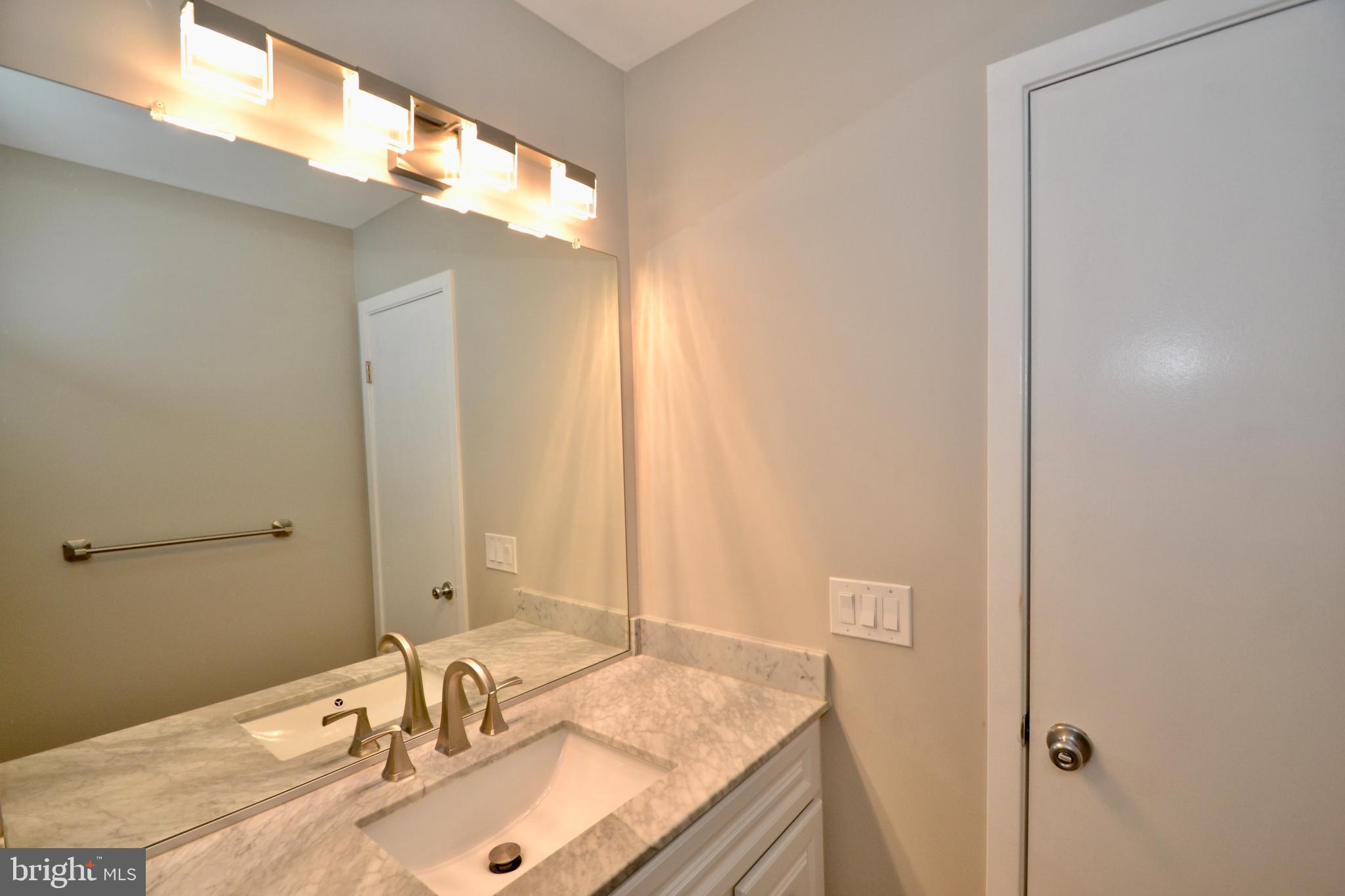 3750 Spring Lake Lane Owings Mills, MD 21117 - Photo 36 of 42 Updated Hall Bath Upper Level