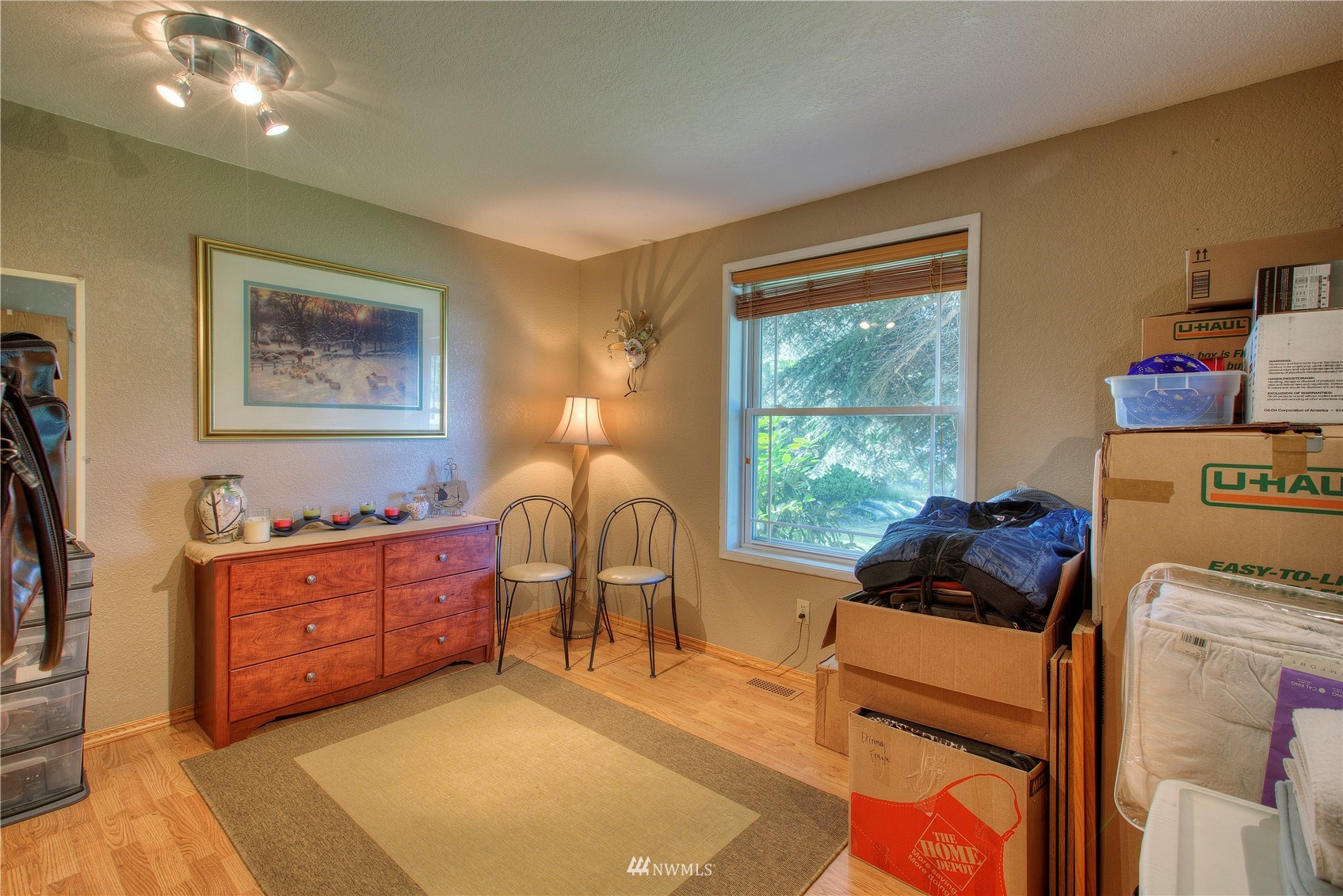 9216 South 239th Street Kent, WA 98031 - Photo 12 of 20 a bedroom with furniture and a window