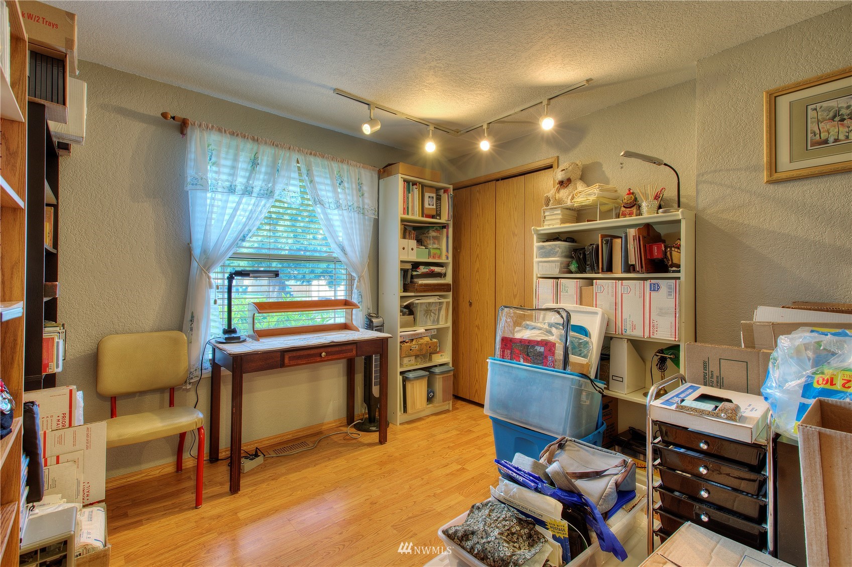 9216 South 239th Street Kent, WA 98031 - Photo 14 of 20 a room with furniture a rug toys and windows