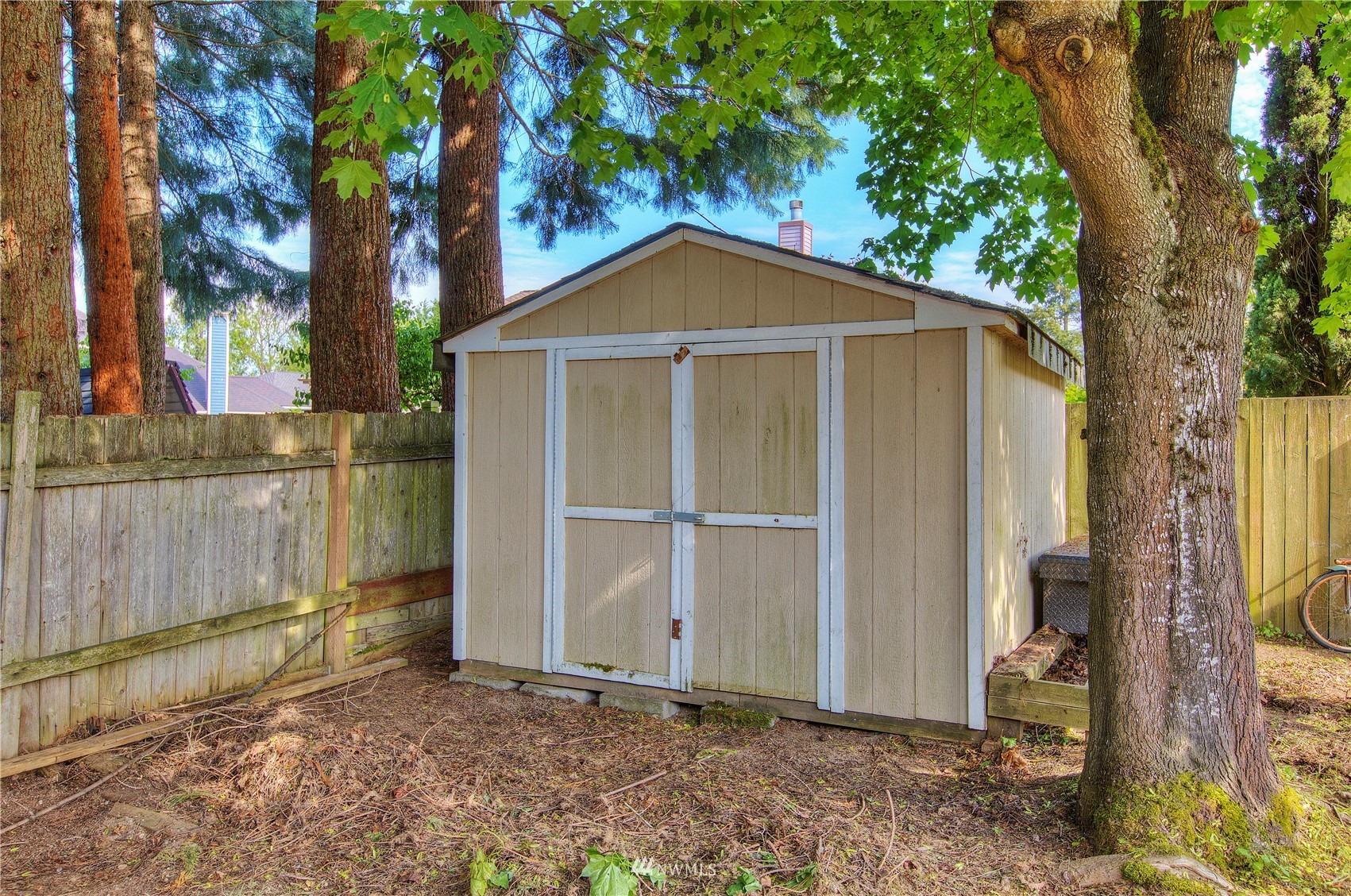 9216 South 239th Street Kent, WA 98031 - Photo 20 of 20 a view of a house with a yard