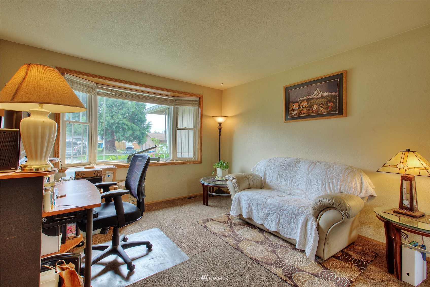 9216 South 239th Street Kent, WA 98031 - Photo 4 of 20 a living room with furniture and a window