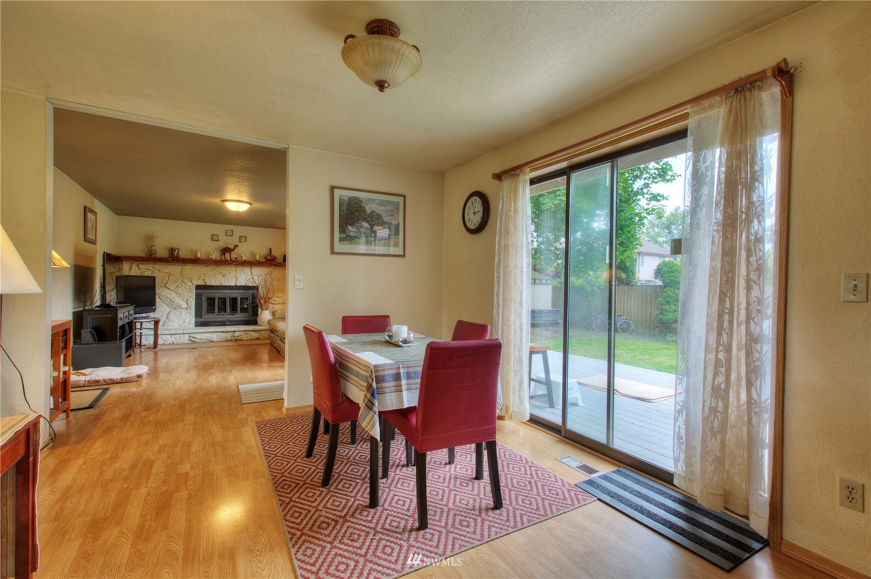9216 South 239th Street Kent, WA 98031 - Photo 8 of 20 a dining room with furniture and wooden floor