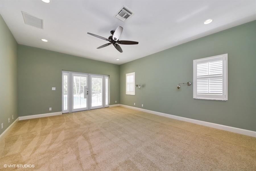 2730 Cardinal Circle Gulf Stream, FL 33483 - Photo 22 of 35 a view of an empty room with a window