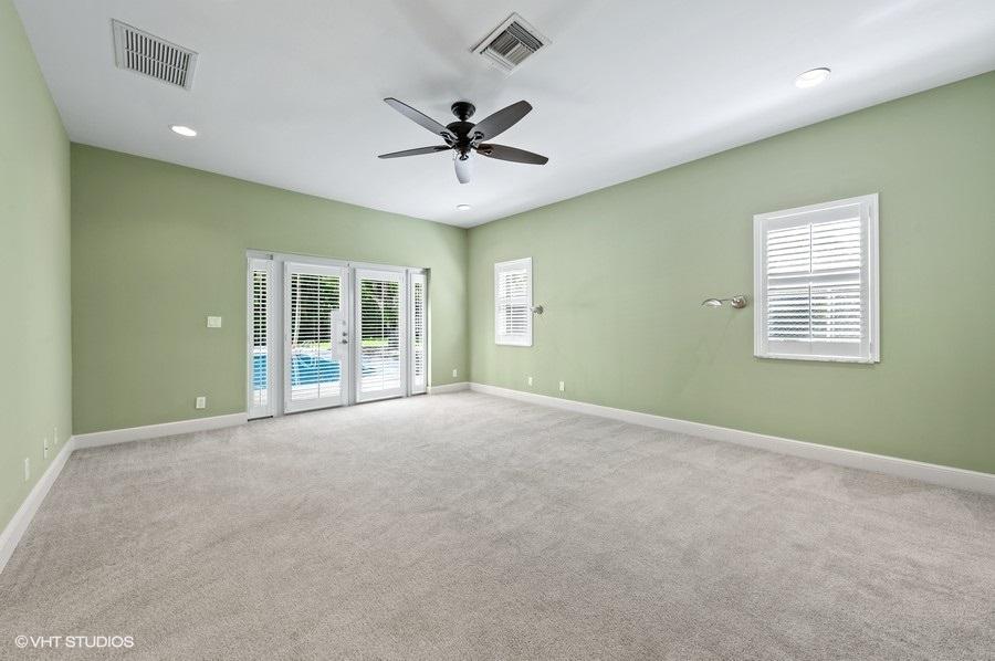 2730 Cardinal Circle Gulf Stream, FL 33483 - Photo 23 of 35 a view of an empty room with a window