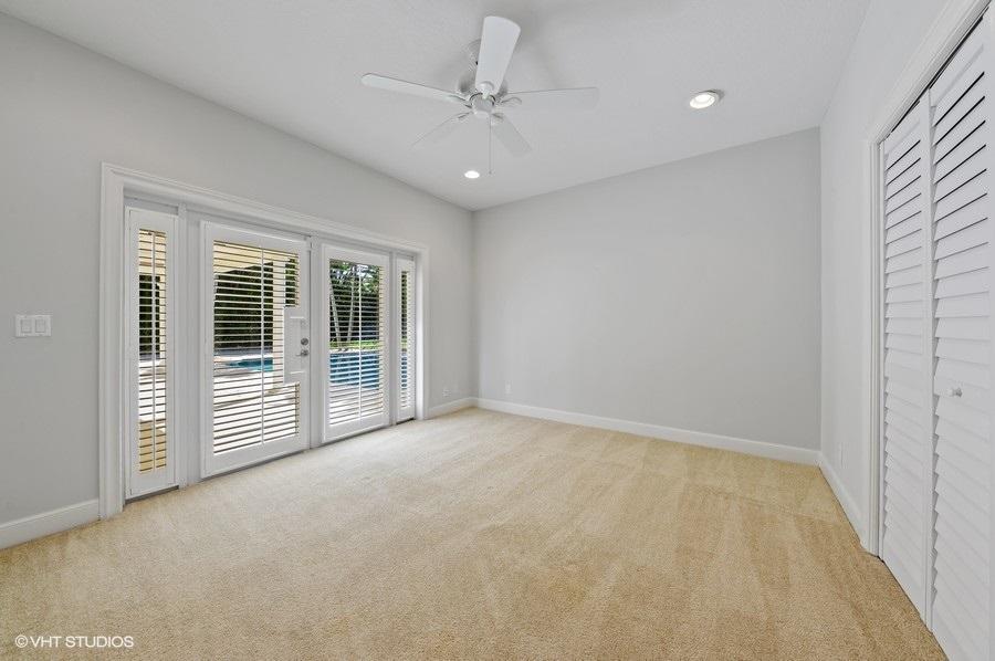 2730 Cardinal Circle Gulf Stream, FL 33483 - Photo 25 of 35 a view of an empty room with a window