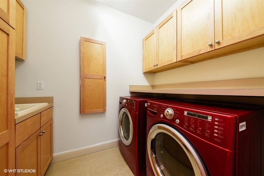 2730 Cardinal Circle Gulf Stream, FL 33483 - Photo 29 of 35 a utility room with dryer and washer