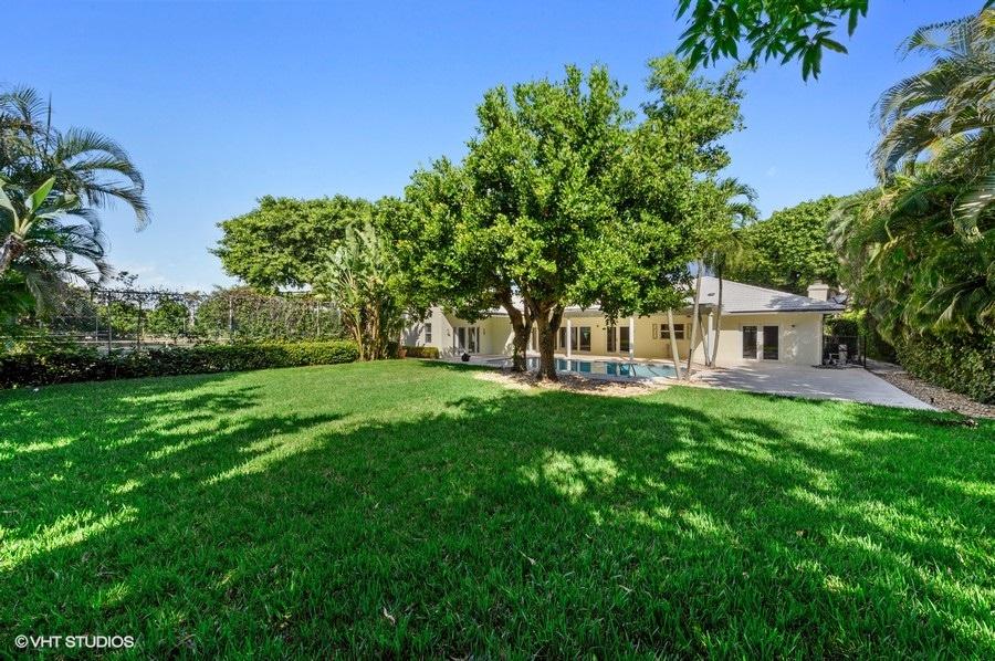 2730 Cardinal Circle Gulf Stream, FL 33483 - Photo 35 of 35 a view of an house with backyard space and garden